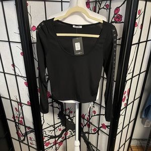 New Fashion Nova Black long sleeve crop top with designs on sleeve. Size Large